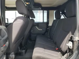 2013 Jeep Wrangler Unlimited Sport with VIN 1C4BJWDG0DL560265, listed as a Copart auction lot 58444045 with 111,354 mi miles and Salvage title. Bid and sale history available at DreamBid. Image 11.