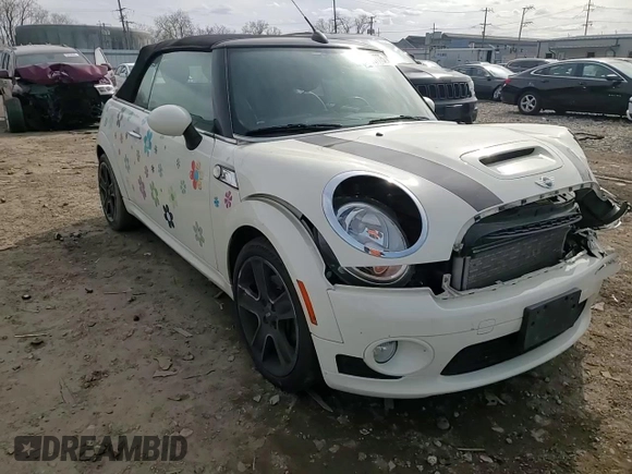 2010 MINI Convertible S with VIN WMWMS3C51ATZ85166, listed as a Copart auction lot 52907775 with 90,090 mi miles and Salvage title. Bid and sale history available at DreamBid. Image 11.