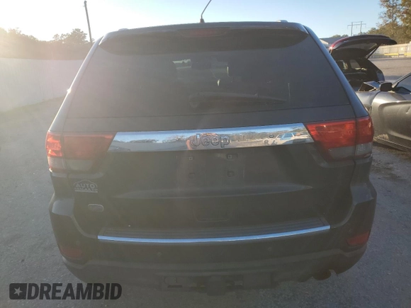 2011 Jeep Grand Cherokee Overland with VIN 1J4RS6GG0BC557302, listed as a Copart auction lot 83851734 with 195,443 mi miles and Salvage Title. Bid and sale history available at DreamBid. Image 6.