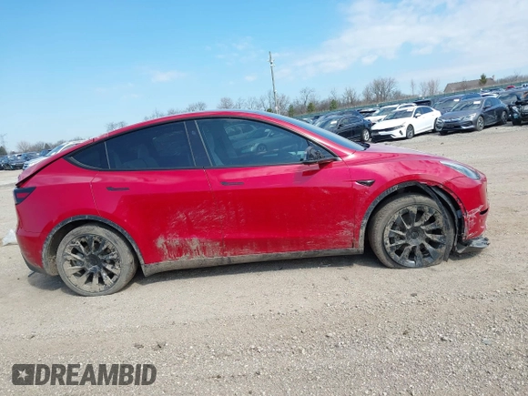 2023 Tesla Model Y Long Range with VIN 7SAYGDEE6PA157652, listed as a IAAI auction lot 41866777 with 22,584 mi miles. Bid and sale history available at carsss.com. Image 13.