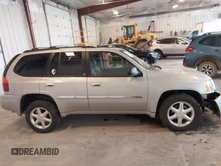 2007 GMC Envoy SLE z VIN 1GKDT13S572152757, wystawiony jako IAAI lot #42095239 z przebiegiem 50 510 mil mil oraz . Historia ofert i sprzedaży dostępna na DreamBid. Obrazek 13.