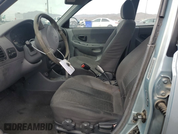 2004 Hyundai Accent GL with VIN KMHCG45C34U567915, listed as a Copart auction lot 43654985 with 141,461 mi miles and Clean Title. Bid and sale history available at carsss.com. Image 7.