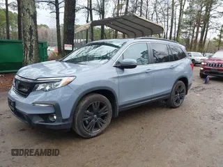 2022 Honda Pilot Special Edition with VIN 5FNYF5H20NB026028, listed as a IAAI auction lot 41801710 with 25,717 mi miles and . Bid and sale history available at carsss.com. Image 2.