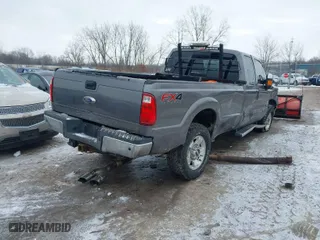2014 Ford Super Duty F-250 SRW XLT with VIN 1FT7X2BT2EEB59870, listed as a IAAI auction lot 41355792 with 191,891 mi miles. Bid and sale history available at carsss.com. Image 4.
