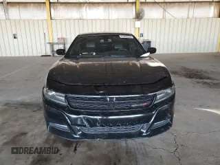 2015 Dodge Charger SXT with VIN 2C3CDXJG9FH748809, listed as a Copart auction lot 61682335 with 128,252 mi miles and Salvage title. Bid and sale history available at DreamBid. Image 5.