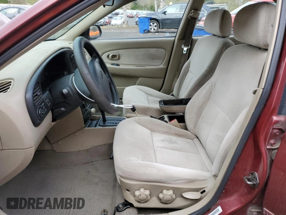 2003 Kia Spectra z VIN KNAFB121835211810, wystawiony jako Copart lot #51289625 z przebiegiem 133 868 mil mil oraz Szkoda całkowita • Salvage title. Historia ofert i sprzedaży dostępna na DreamBid. Obrazek 7.
