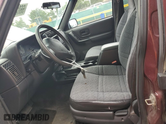 2000 Jeep Cherokee with VIN 1J4FF48SXYL198290, listed as a Copart auction lot 66026705 with 201,409 mi miles and Clean title. Bid and sale history available at DreamBid. Image 7.