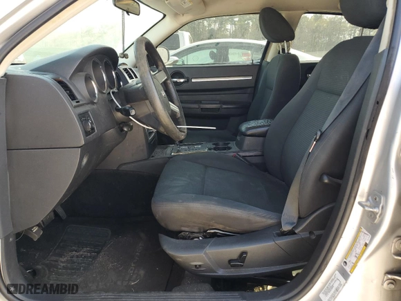 2010 Dodge Charger SXT with VIN 2B3CA3CV7AH210466, listed as a Copart auction lot 50699505 with 205,829 mi miles and Salvage Title. Bid and sale history available at carsss.com. Image 7.
