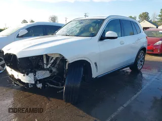 2021 BMW X5 sDrive40i with VIN 5UXCR4C07M9F23816, listed as a IAAI auction lot 41871364 with 55,401 mi miles. Bid and sale history available at carsss.com. Image 2.