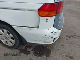 2001 Honda Odyssey EX z VIN 2HKRL18661H566973, wystawiony jako IAAI lot #42117015 z przebiegiem 206 999 mil mil oraz . Historia ofert i sprzedaży dostępna na DreamBid. Obrazek 6.