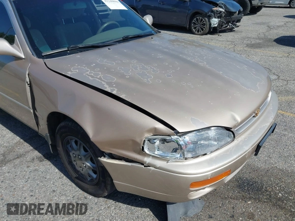 1996 Toyota Camry DX z VIN JT2BG12K0T0347950, wystawiony jako IAAI lot #42248890 z przebiegiem 264 017 mil mil oraz . Historia ofert i sprzedaży dostępna na DreamBid. Obrazek 6.