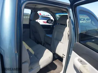 2010 Chevrolet Silverado 1500 LT with VIN 3GCRCSE00AG129825, listed as a IAAI auction lot 42003399 with 305,636 mi miles. Bid and sale history available at carsss.com. Image 8.