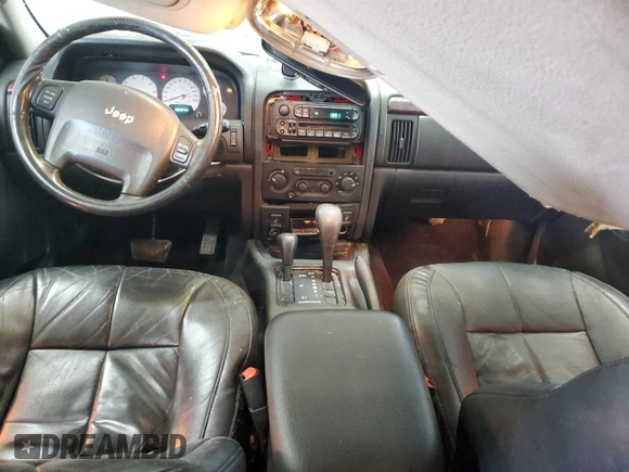 2002 Jeep Grand Cherokee Limited z VIN 1J8GW58S02C279251, wystawiony jako Copart lot #61563465 z przebiegiem 182 244 mil mil oraz Szkoda całkowita • Salvage title. Historia ofert i sprzedaży dostępna na DreamBid. Obrazek 8.
