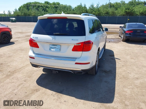 2014 Mercedes-Benz GL 450 with VIN 4JGDF7CE3EA336481, listed as a IAAI auction lot 42647526 with 145,311 mi miles and . Bid and sale history available at DreamBid. Image 4.