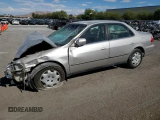1999 Honda Accord LX with VIN 1HGCG5644XA063432, listed as a Copart auction lot 84875594 with 107,133 mi miles and Salvage title. Bid and sale history available at DreamBid. Image 1.