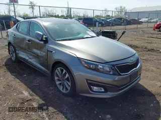 2014 Kia Optima SXL Turbo with VIN 5XXGR4A62EG323308, listed as a IAAI auction lot 42069853 with 118,168 mi miles and . Bid and sale history available at carsss.com. Image 1.