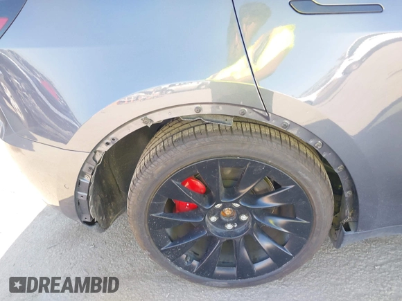 2022 Tesla Model Y Performance z VIN 7SAYGDEF2NF490794, wystawiony jako IAAI lot #42218742 z przebiegiem 41 402 mil mil oraz . Historia ofert i sprzedaży dostępna na DreamBid. Obrazek 6.