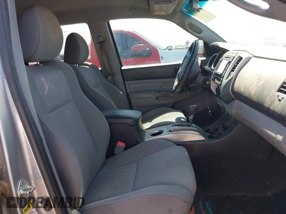 2015 Toyota Tacoma with VIN 3TMLU4EN6FM188736, listed as a IAAI auction lot 42605859 with 210,717 mi miles and . Bid and sale history available at DreamBid. Image 5.