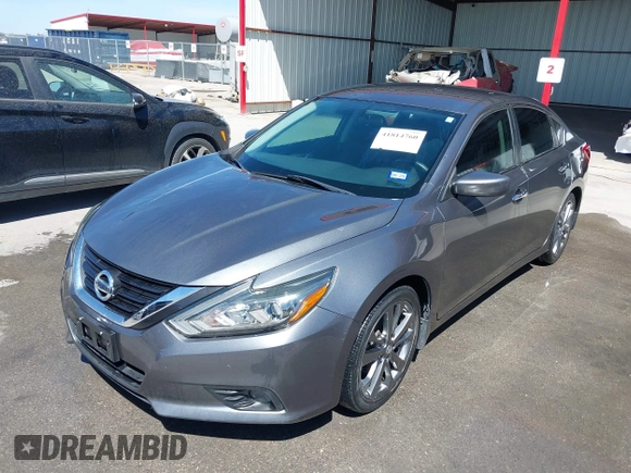 2018 Nissan Altima 2.5 SR with VIN 1N4AL3AP7JC475451, listed as a IAAI auction lot 41814760 with 38,440 mi miles. Bid and sale history available at carsss.com. Image 18.