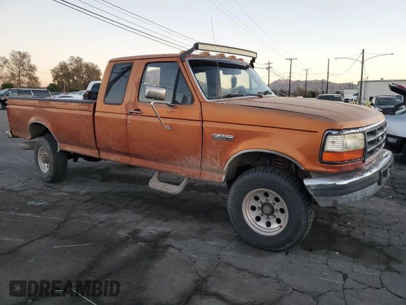 1994 Ford F-250 with VIN 1FTHX25F2RKB78761, listed as a Copart auction lot 85764054 with 223,641 mi miles and Salvage Title. Bid and sale history available at carsss.com. Image 4.