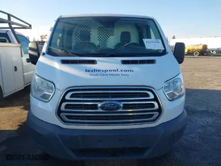 2016 Ford Transit Cargo Van with VIN 1FTYR1ZM8GKA39180, listed as a IAAI auction lot 41245425 with 115,018 mi miles. Bid and sale history available at carsss.com. Image 12.