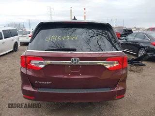 2018 Honda Odyssey EX-L z VIN 5FNRL6H71JB072363, wystawiony jako IAAI lot #41954744 z przebiegiem 104 820 mil mil oraz . Historia ofert i sprzedaży dostępna na DreamBid. Obrazek 16.