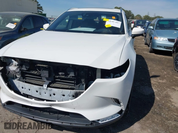2016 Mazda CX-9 Signature with VIN JM3TCBEY4G0118231, listed as a IAAI auction lot 41903023 with 77,475 mi miles and . Bid and sale history available at carsss.com. Image 6.