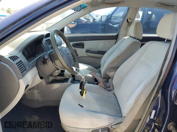 2004 Kia Spectra LX with VIN KNAFE122845046827, listed as a Copart auction lot 52262575 with 91,786 mi miles and Clean Title. Bid and sale history available at carsss.com. Image 7.
