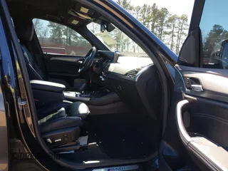 2019 BMW X3 M40i with VIN 5UXTS3C57KLR73084, listed as a IAAI auction lot 41390072 with 83,277 mi miles and . Bid and sale history available at DreamBid. Image 5.