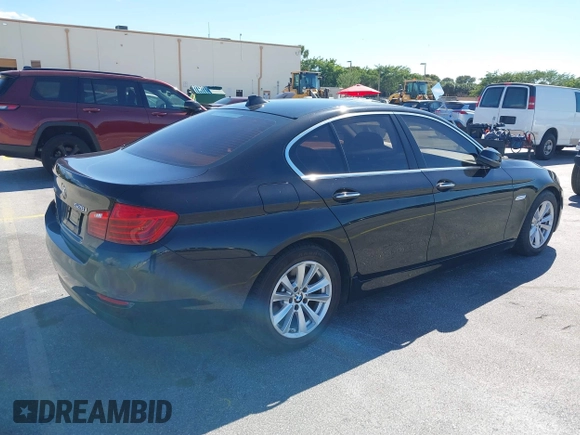 2015 BMW 5 Series 528i xDrive with VIN WBA5A7C58FG144069, listed as a IAAI auction lot 41854112 with 136,403 mi miles and . Bid and sale history available at DreamBid. Image 4.