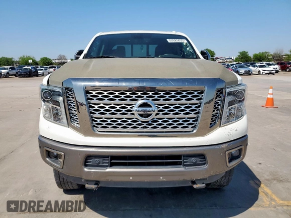2017 Nissan Titan Pro-4X z VIN 1N6BA1F42HN575024, wystawiony jako Copart lot #52025835 z przebiegiem 23 422 mil mil oraz Czysty tytuł • Clean title. Historia ofert i sprzedaży dostępna na DreamBid. Obrazek 5.