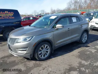 2016 Lincoln MKC Select with VIN 5LMCJ2D95GUJ08172, listed as a IAAI auction lot 41504279 with 73,425 mi miles. Bid and sale history available at carsss.com. Image 2.