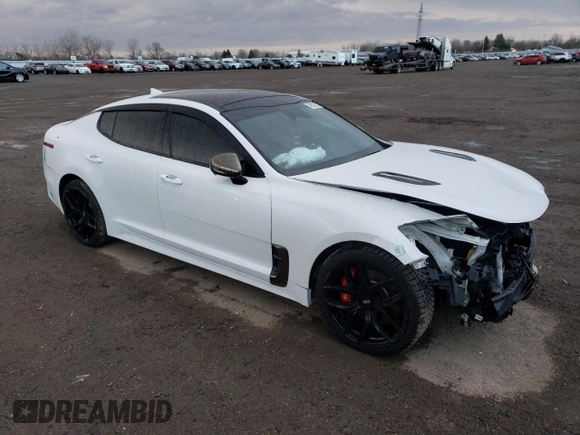 2022 Kia Stinger GT2 with VIN KNAE55LC5N6102759, listed as a Copart auction lot 49827825 with 101,311 mi miles and Salvage Title. Bid and sale history available at DreamBid. Image 4.
