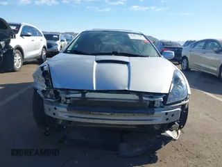 2003 Toyota Celica GT with VIN JTDDR32T230159560, listed as a IAAI auction lot 41657710 with 1 mi miles. Bid and sale history available at carsss.com. Image 6.