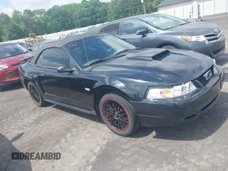 2003 Ford Mustang GT Deluxe z VIN 1FAFP45XX3F417295, wystawiony jako IAAI lot #42229765 z przebiegiem 161 488 mil mil oraz . Historia ofert i sprzedaży dostępna na DreamBid. Obrazek 1.