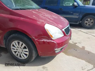 2014 Kia Sedona LX with VIN KNDMG4C71E6564595, listed as a IAAI auction lot 42015687 with 208,270 mi miles. Bid and sale history available at carsss.com. Image 6.