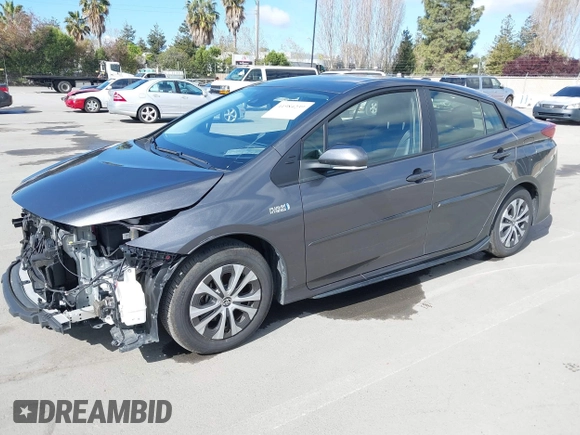 2022 Toyota Prius LE with VIN JTDKAMFP7N3206830, listed as a IAAI auction lot 41984239 with 57,681 mi miles and . Bid and sale history available at DreamBid. Image 2.