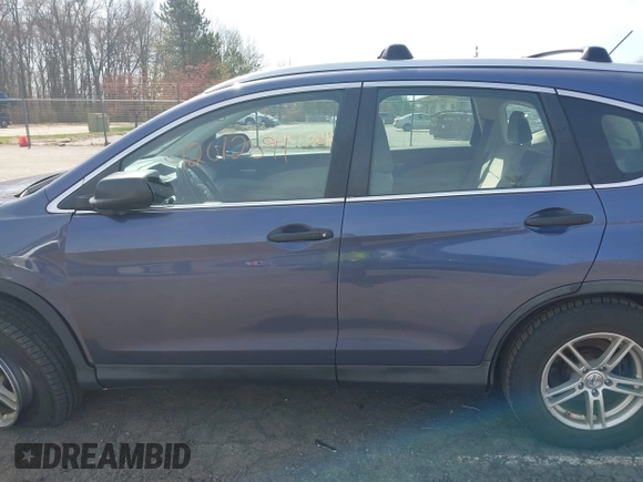2013 Honda CR-V LX with VIN 2HKRM4H30DH638243, listed as a IAAI auction lot 42012591 with Not Provided miles and . Bid and sale history available at DreamBid. Image 13.