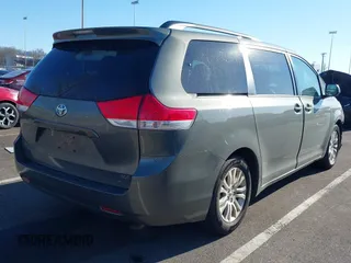 2011 Toyota Sienna XLE AAS with VIN 5TDYK3DC4BS072693, listed as a IAAI auction lot 41579262 with 146,201 mi miles. Bid and sale history available at carsss.com. Image 4.