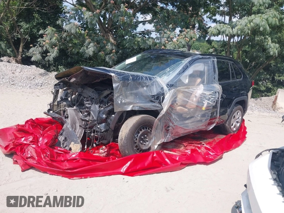 2019 Toyota RAV4 LE with VIN 2T3H1RFV3KC015535, listed as a IAAI auction lot 41999076 with 99,375 mi miles and . Bid and sale history available at DreamBid. Image 2.