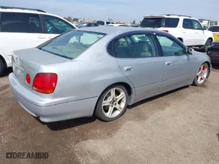 1999 Lexus GS 300 Luxury Perform Sdn with VIN JT8BD68S5X0066963, listed as a IAAI auction lot 41808902 with 213,617 mi miles. Bid and sale history available at carsss.com. Image 4.
