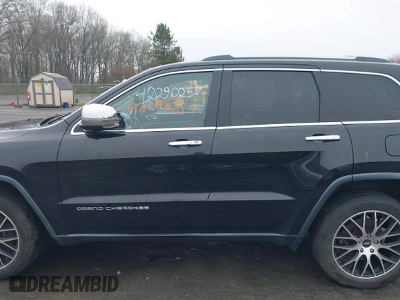 2014 Jeep Grand Cherokee Limited z VIN 1C4RJFBG0EC195654, wystawiony jako IAAI lot #42090257 z przebiegiem 195 615 mil mil oraz . Historia ofert i sprzedaży dostępna na DreamBid. Obrazek 14.