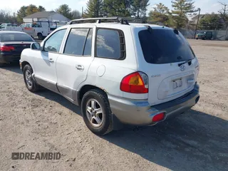 2002 Hyundai Santa Fe GLS with VIN KM8SC73D32U249942, listed as a IAAI auction lot 41660482 with 151,164 mi miles. Bid and sale history available at carsss.com. Image 3.