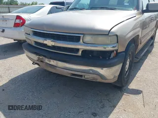 2001 Chevrolet Suburban LS z VIN 3GNEC16T21G214738, wystawiony jako IAAI lot #42433747 z przebiegiem Nie podano mil oraz . Historia ofert i sprzedaży dostępna na DreamBid. Obrazek 11.