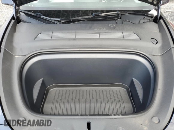 2024 Tesla Model Y Long Range with VIN 7SAYGDEE4RA285620, listed as a Copart auction lot 57883015 with 18,841 mi miles and Salvage title. Bid and sale history available at DreamBid. Image 11.