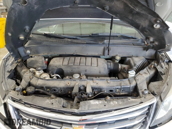 2015 Chevrolet Traverse LT z VIN 1GNKVHKD7FJ123314, wystawiony jako Copart lot #68526674 z przebiegiem Nie podano mil oraz Nie do naprawy • Non repairable. Historia ofert i sprzedaży dostępna na DreamBid. Obrazek 12.