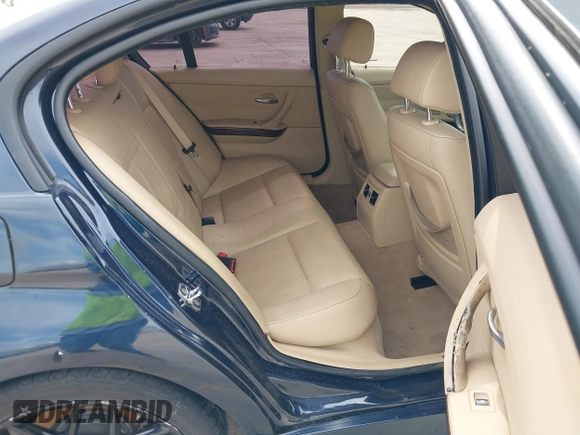 2009 BMW 3 Series 328i with VIN WBAPH77579NM31725, listed as a IAAI auction lot 41901344 with 143,905 mi miles. Bid and sale history available at carsss.com. Image 8.