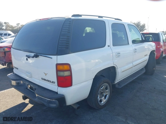 2003 Chevrolet Tahoe LT with VIN 1GNEC13Z73R168819, listed as a IAAI auction lot 41679179 with 141,164 mi miles. Bid and sale history available at carsss.com. Image 4.