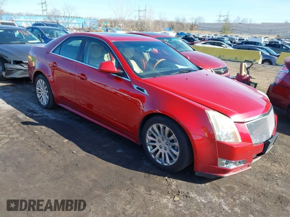 2011 Cadillac CTS Premium with VIN 1G6DS5ED7B0133154, listed as a IAAI auction lot 41822033 with 121,862 mi miles. Bid and sale history available at carsss.com. Image 1.