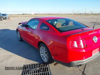 2012 Ford Mustang V6 Premium with VIN 1ZVBP8AM5C5262332, listed as a IAAI auction lot 41243050 with 105,157 mi miles. Bid and sale history available at carsss.com. Image 3.